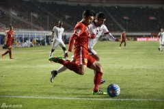 习近平为国足发展指明"踢法"